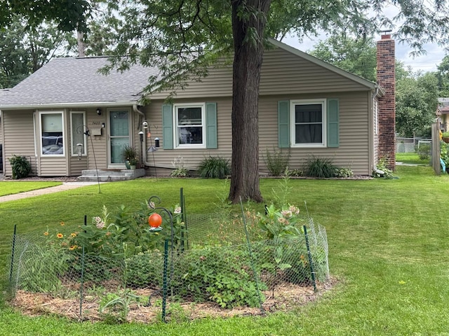 7420 Columbus Ave, Richfield, MN 55423 - view of front of property with a chimney and a shingled roof