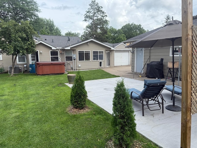 7420 Columbus Ave, Richfield, MN 55423 - rear view of property with a hot tub, a patio, a yard, driveway, and a shingled roof