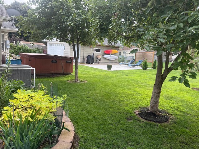 7420 Columbus Ave, Richfield, MN 55423 - view of yard with a hot tub and a patio area