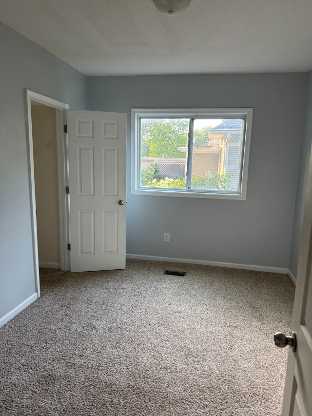 663 Smith Ave S, Saint Paul, MN 55107 - unfurnished room with carpet floors
