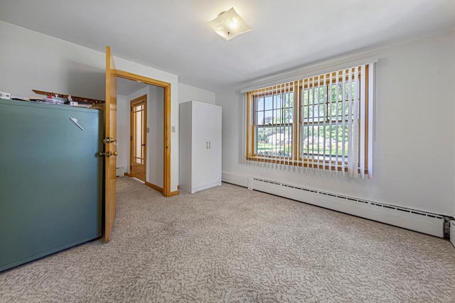 440 6th St, Lafayette, MN 56054 - unfurnished room with carpet, a baseboard radiator, and baseboard heating