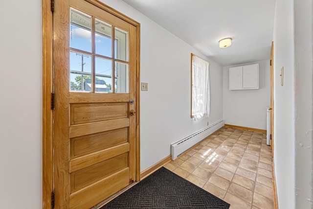 440 6th St, Lafayette, MN 56054 - entryway with a baseboard radiator and light tile patterned flooring
