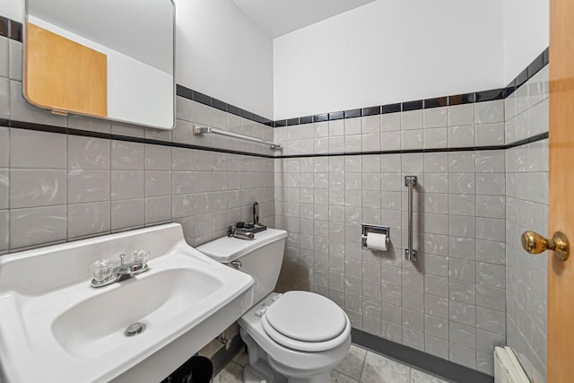 440 6th St, Lafayette, MN 56054 - bathroom featuring tile walls and a baseboard heating unit