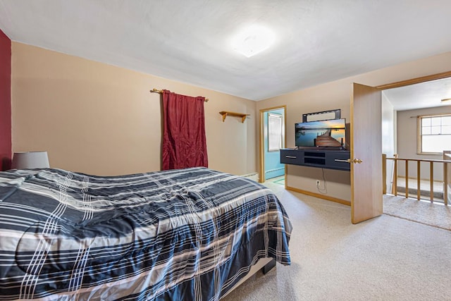 440 6th St, Lafayette, MN 56054 - bedroom featuring light colored carpet and a baseboard heating unit