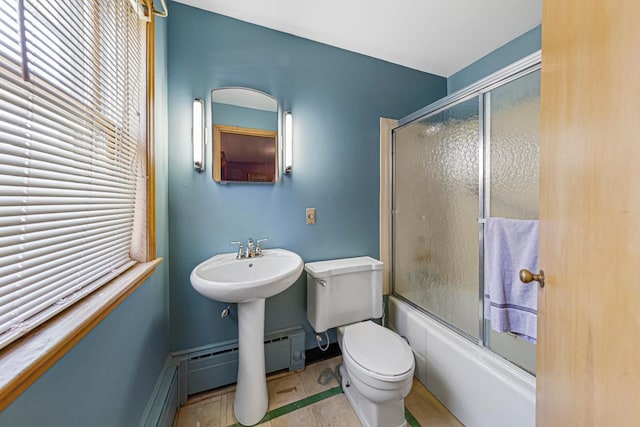 440 6th St, Lafayette, MN 56054 - full bath featuring combined bath / shower with glass door, plenty of natural light, and tile patterned floors