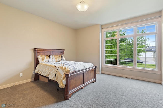 1811 7th St, Fargo, ND 58078 - carpeted bedroom with baseboards