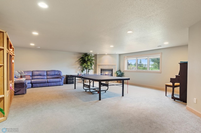 1811 7th St, Fargo, ND 58078 - game room featuring carpet flooring, recessed lighting, and a fireplace