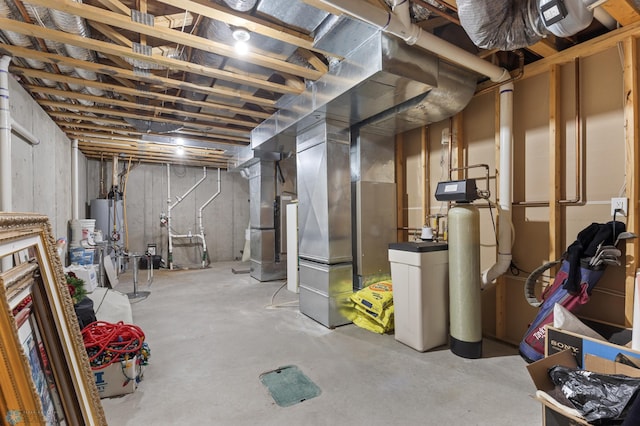 1811 7th St, Fargo, ND 58078 - unfinished below grade area featuring a water softener and water heater
