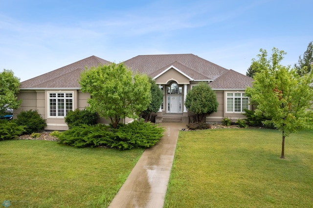 1811 7th St, Fargo, ND 58078 - view of front of property featuring a front lawn and a shingled roof