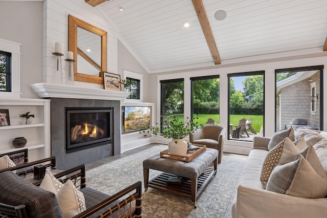 5815 Howards Point Rd, Shorewood, MN 55331 - living room featuring a tiled fireplace, wood finished floors, a wood ceiling with exposed beams, and high vaulted ceiling