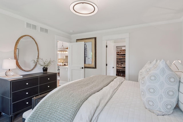 5815 Howards Point Rd, Shorewood, MN 55331 - bedroom with ornamental molding, a walk in closet, and ensuite bath