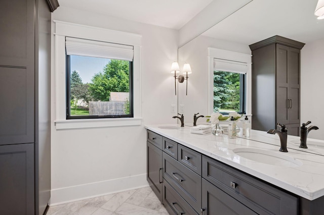 5815 Howards Point Rd, Shorewood, MN 55331 - bathroom with double vanity and marble finish flooring