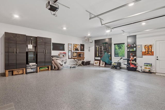 5815 Howards Point Rd, Shorewood, MN 55331 - garage with a garage door opener, electric panel, recessed lighting, and a wall mounted air conditioner