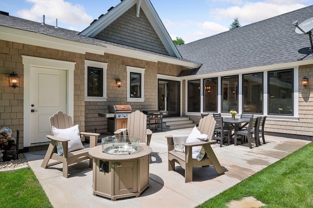 5815 Howards Point Rd, Shorewood, MN 55331 - view of patio with a fire pit, grilling area, outdoor dining space, and entry steps