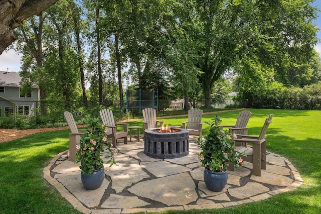 5815 Howards Point Rd, Shorewood, MN 55331 - view of patio with an outdoor fire pit