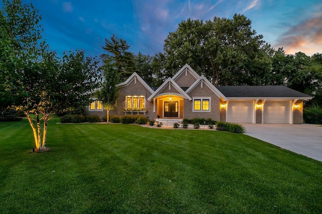 5815 Howards Point Rd, Shorewood, MN 55331 - craftsman-style home featuring a garage, concrete driveway, and a front yard