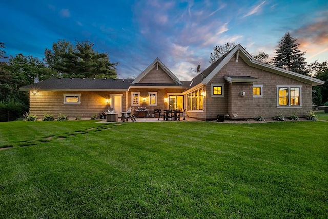 5815 Howards Point Rd, Shorewood, MN 55331 - rear view of house with a yard and a patio