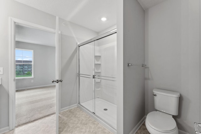 7407 E Ramsey Pkwy NW, Ramsey, MN 55303 - bathroom with a shower stall and baseboards