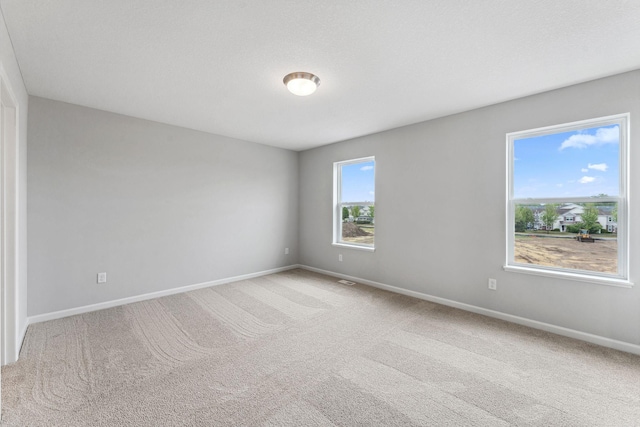 7407 E Ramsey Pkwy NW, Ramsey, MN 55303 - empty room featuring carpet floors