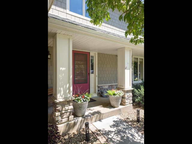 461 Dudley Ave, Shoreview, MN 55126 - view of exterior entry featuring a porch and stone siding
