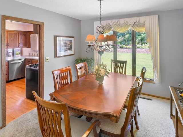 461 Dudley Ave, Shoreview, MN 55126 - dining room with a chandelier and light colored carpet