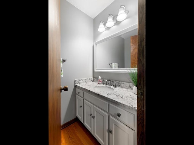 461 Dudley Ave, Shoreview, MN 55126 - bathroom featuring vanity and wood finished floors