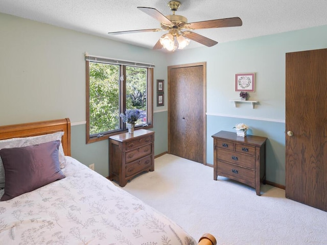 461 Dudley Ave, Shoreview, MN 55126 - carpeted bedroom with a ceiling fan, a textured ceiling, and a closet