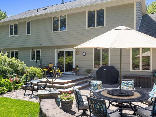 461 Dudley Ave, Shoreview, MN 55126 - back of house featuring a patio and outdoor dining area