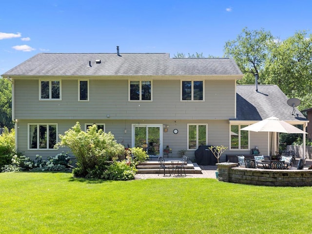 461 Dudley Ave, Shoreview, MN 55126 - back of property with a patio area, a lawn, and a shingled roof