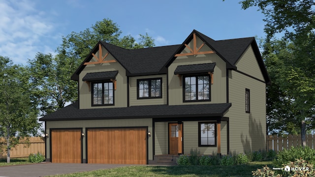 987 Island Lake Ave, Shoreview, MN 55126 - view of front facade featuring a garage, asphalt driveway, and a shingled roof