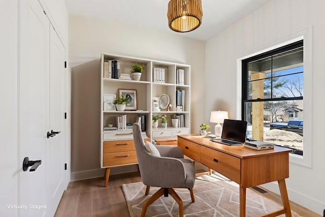 987 Island Lake Ave, Shoreview, MN 55126 - office area featuring light wood-style floors and baseboards