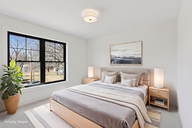 987 Island Lake Ave, Shoreview, MN 55126 - carpeted bedroom featuring baseboards
