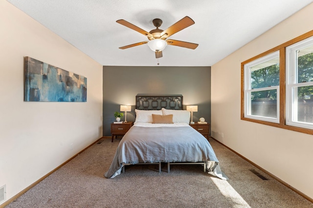 1111 Edgewater Ave, Arden Hills, MN 55112 - carpeted bedroom featuring ceiling fan and baseboards