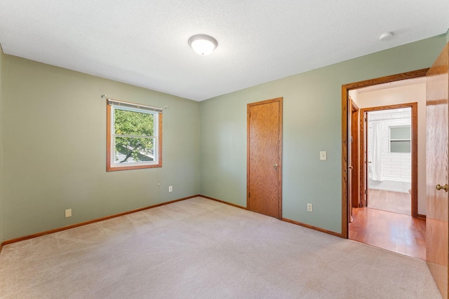 1111 Edgewater Ave, Arden Hills, MN 55112 - unfurnished bedroom with light colored carpet and a closet