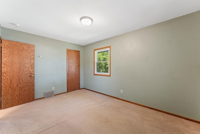 1111 Edgewater Ave, Arden Hills, MN 55112 - empty room featuring carpet and baseboards
