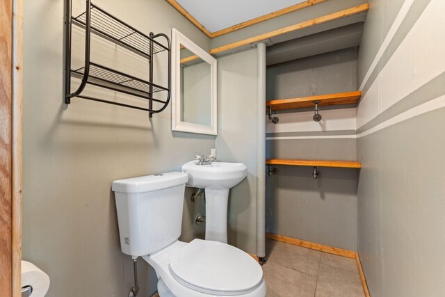 1111 Edgewater Ave, Arden Hills, MN 55112 - bathroom with toilet and tile patterned flooring