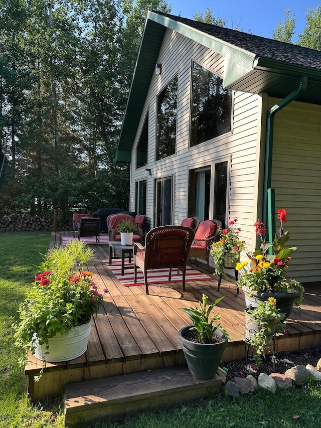 1415 Riverside Dr NW Unit 1415, Baudette, MN 56623 - wooden deck featuring outdoor lounge area