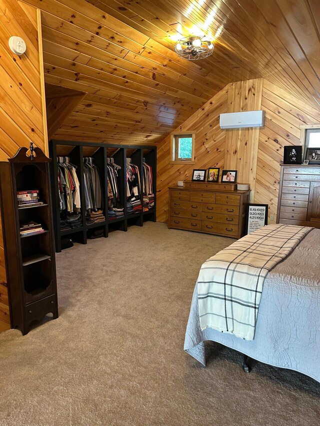 1415 Riverside Dr NW Unit 1415, Baudette, MN 56623 - carpeted bedroom with vaulted ceiling, wooden walls, and wood ceiling