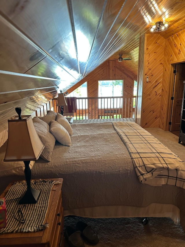 1415 Riverside Dr NW Unit 1415, Baudette, MN 56623 - carpeted bedroom with vaulted ceiling and wooden walls