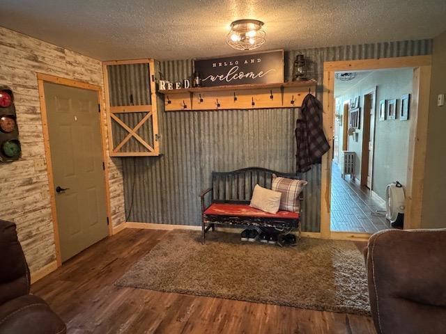 1415 Riverside Dr NW Unit 1415, Baudette, MN 56623 - mudroom with wood finished floors and a textured ceiling