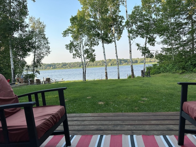 1415 Riverside Dr NW Unit 1415, Baudette, MN 56623 - wooden deck with a yard and a water view