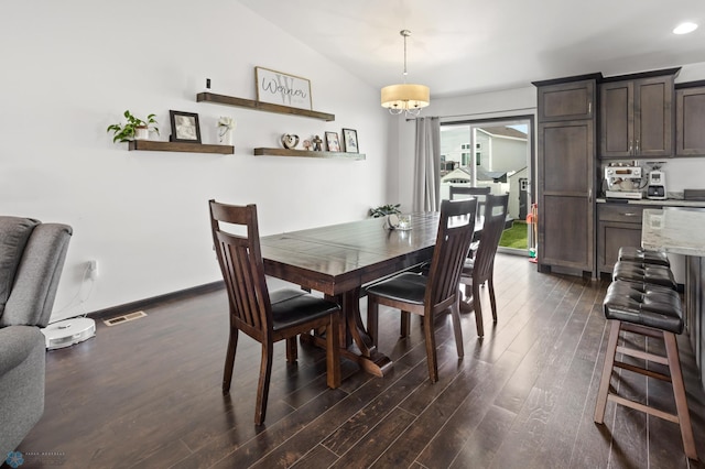 6028 59th Ave S, Fargo, ND 58104 - dining room featuring dark wood-type flooring, lofted ceiling, a chandelier, and recessed lighting