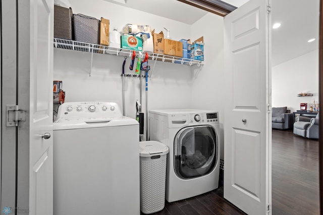 6028 59th Ave S, Fargo, ND 58104 - laundry area featuring washer and clothes dryer and dark wood-type flooring