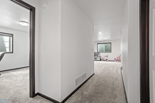 6028 59th Ave S, Fargo, ND 58104 - hallway with carpet flooring and recessed lighting