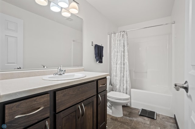 6028 59th Ave S, Fargo, ND 58104 - full bathroom featuring vanity, shower / bath combination with curtain, and stone finish flooring