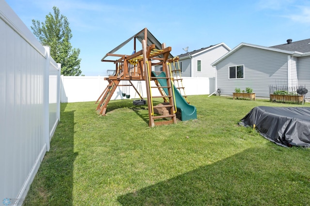 6028 59th Ave S, Fargo, ND 58104 - view of play area featuring a fenced backyard