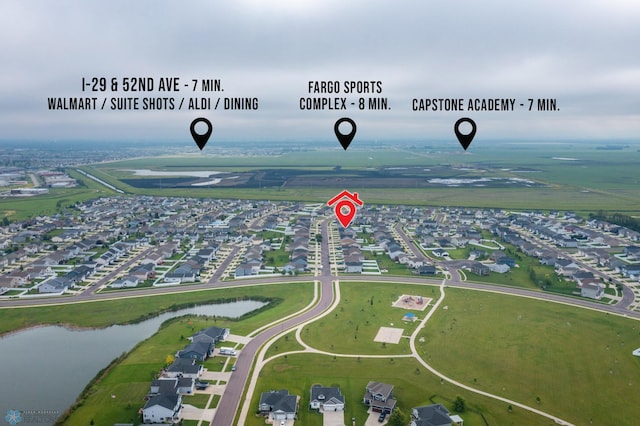 6028 59th Ave S, Fargo, ND 58104 - aerial perspective of suburban area with a nearby body of water