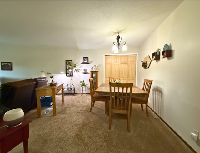 120 Demont Ave E Unit 208, Little Canada, MN 55117 - dining space with carpet floors and a chandelier