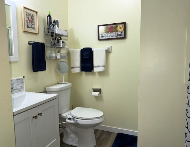 120 Demont Ave E Unit 208, Little Canada, MN 55117 - bathroom featuring wood finished floors and vanity