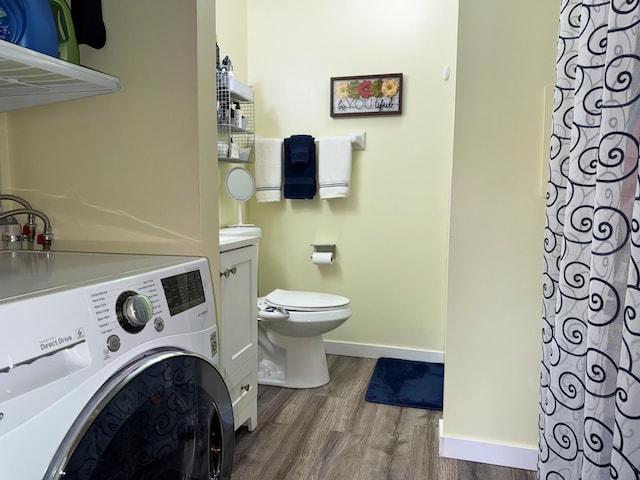 120 Demont Ave E Unit 208, Little Canada, MN 55117 - full bathroom with washer / clothes dryer, wood finished floors, vanity, and a shower with shower curtain